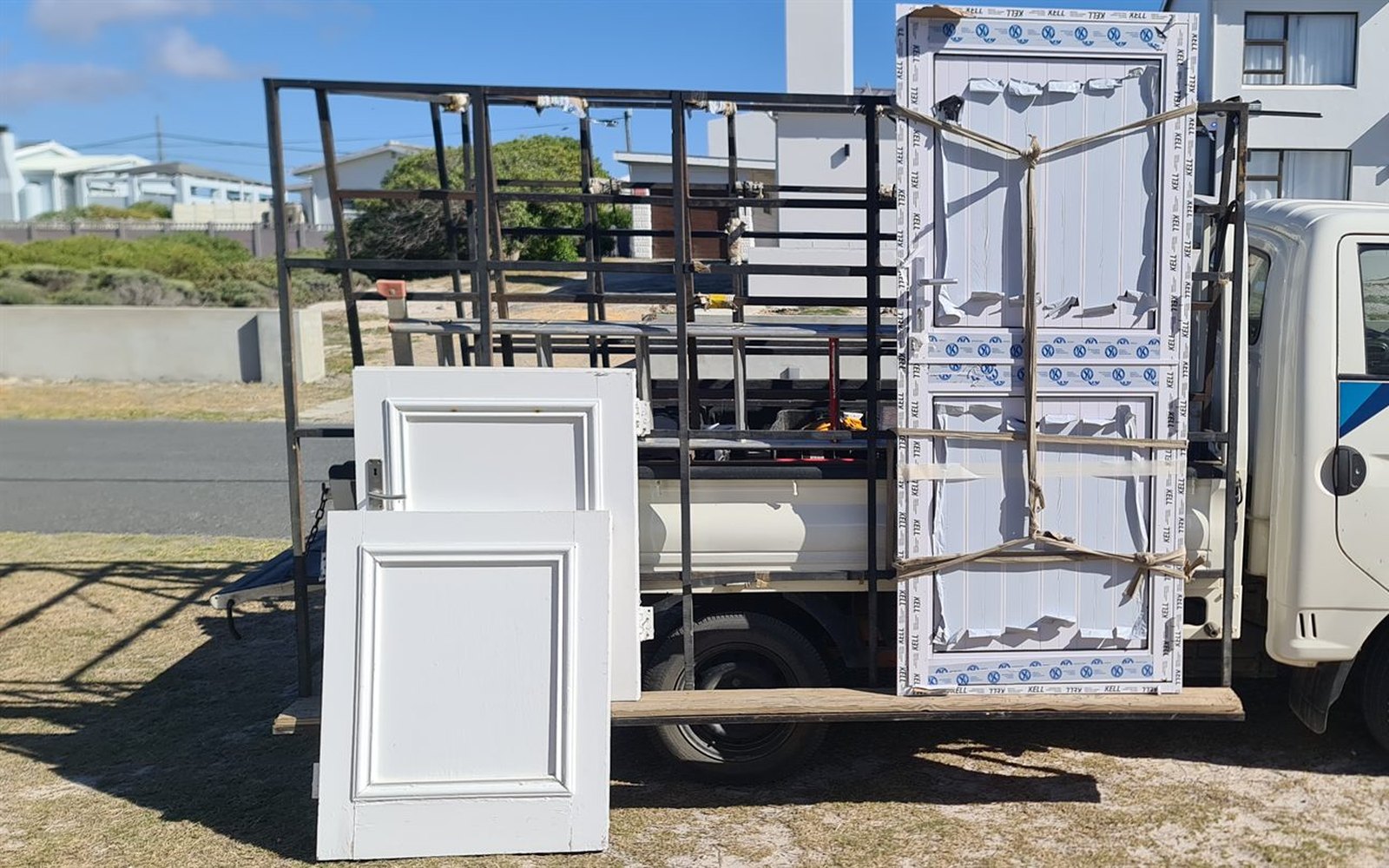 Aluminium doors and frames loaded for delivery by Overberg Double Glazing & Aluminium