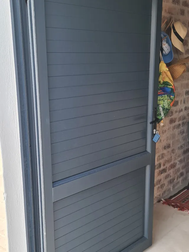Aluminium louvre door, Struisbaai