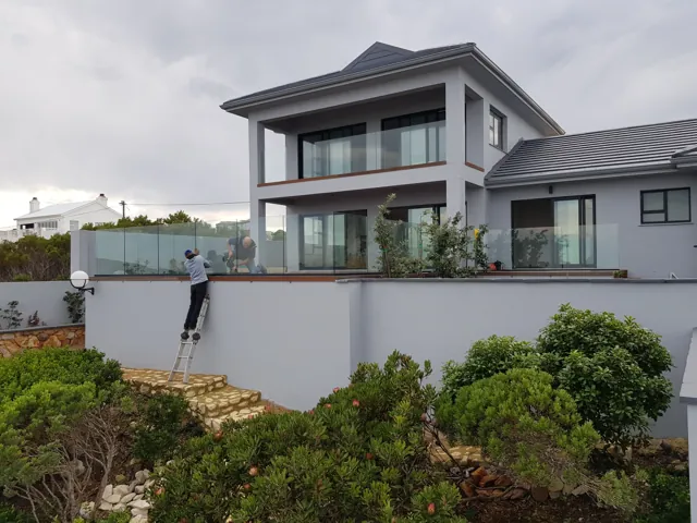 Casement windows and frameless glass balustrades, Struisbaai