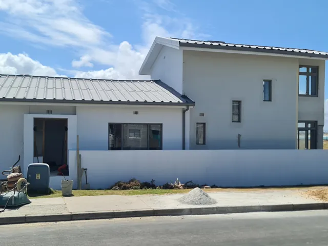 Casement windows and sectional garage door, Struisbaai