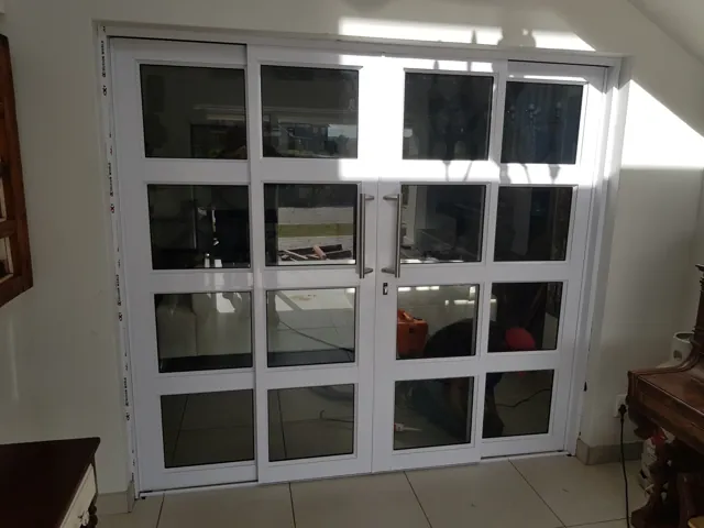 Cottage-pane hinged doors with sidelights, Struisbaai
