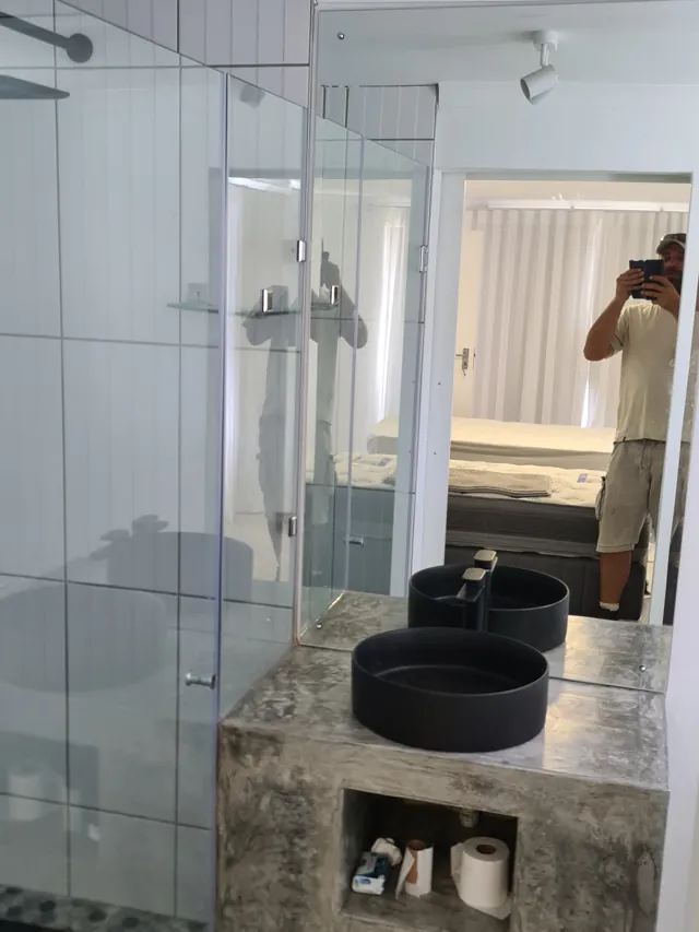 Frameless glass shower and mirror, Struisbaai