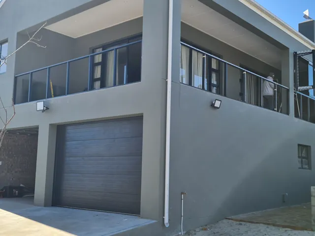 Sectional garage door, Palace sliding doors and casement windows, Melkbosstrand