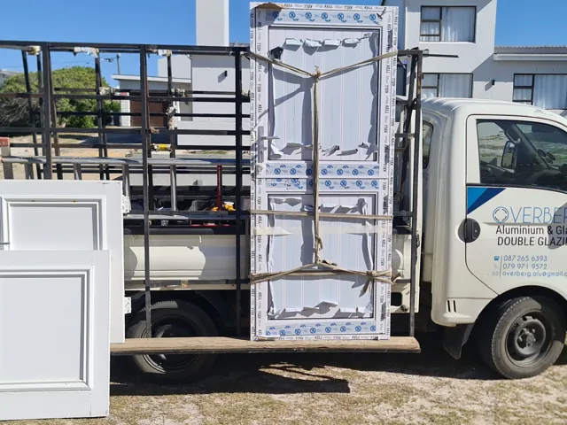 Casement windows and doors loaded for delivery, Struisbaai