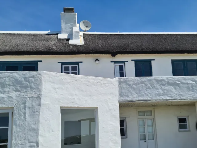 Cottage-pane casement windows and hinged door, Struisbaai