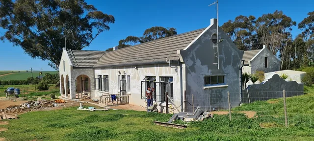 White aluminium windows and doors on a rural home